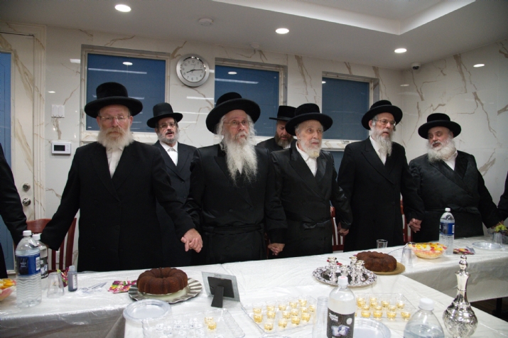 כ