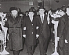 הרב יוזפא מליסקא walking a young man to the chuppah. The chassan is Reb Tzvi Yosef (Hershel) Spiegel, z”l, whose wife, Mrs. Leah Spiegel, a”h, was a descendant of the Tal Chaim of Liska.