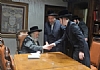 אצל כ