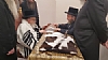אצל כ