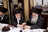 Liska Rebbe picking up the becher for his brother the Hivnover Rov