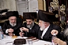 Liska Rebbe with kos shel baracha L-R Reb Duvid Moskovits Rosh Kehillah Skulen - Mechuten of Liska Rebbe, Rav Tzvi Weiss  - Uhely Rebbe, Liska Rebbe