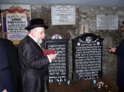כ