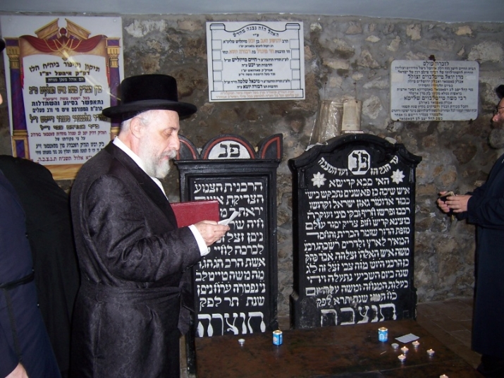 כ