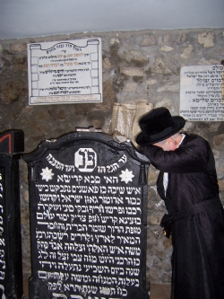 כ