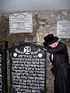 כ