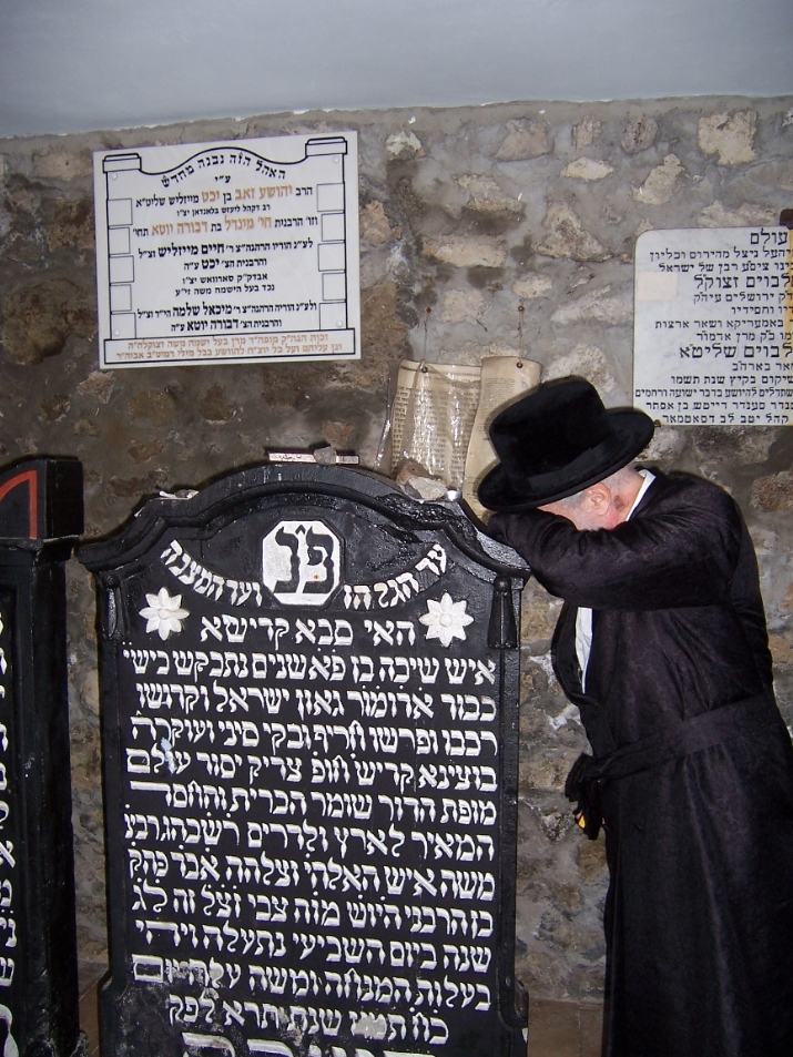 כ