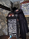 כ